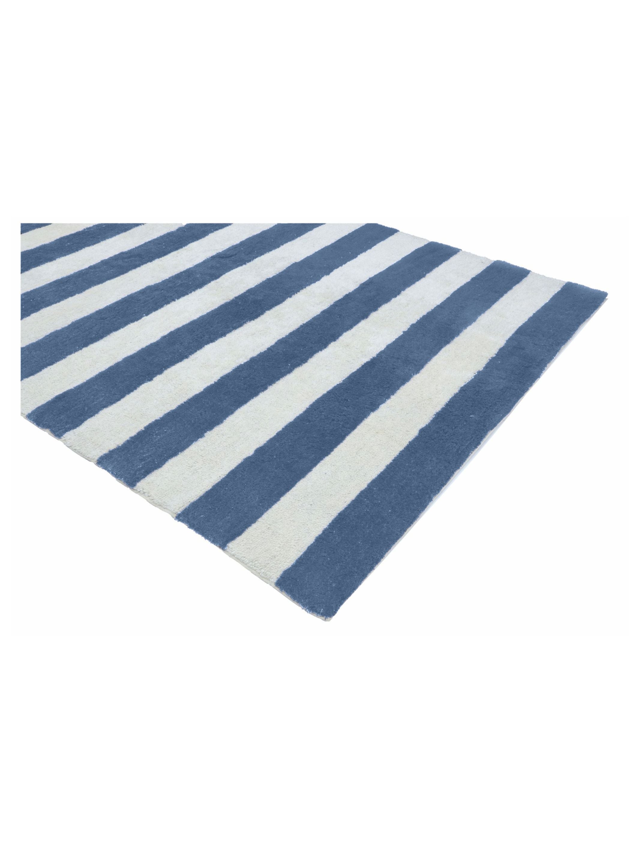 Blue and white striped rug on a white background