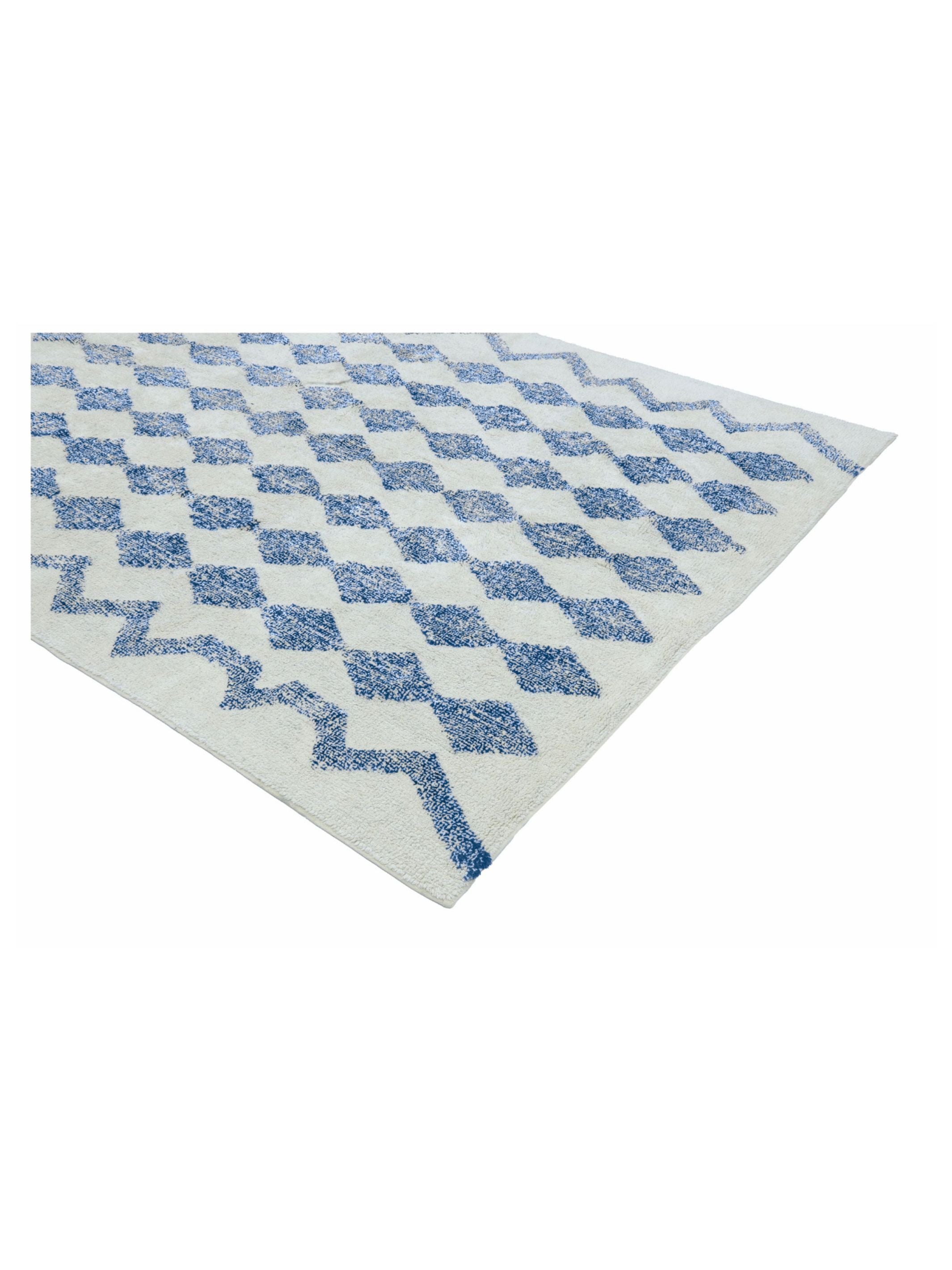 Rug with blue geometric pattern on a white background