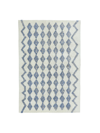 Rug with blue geometric pattern on a white background
