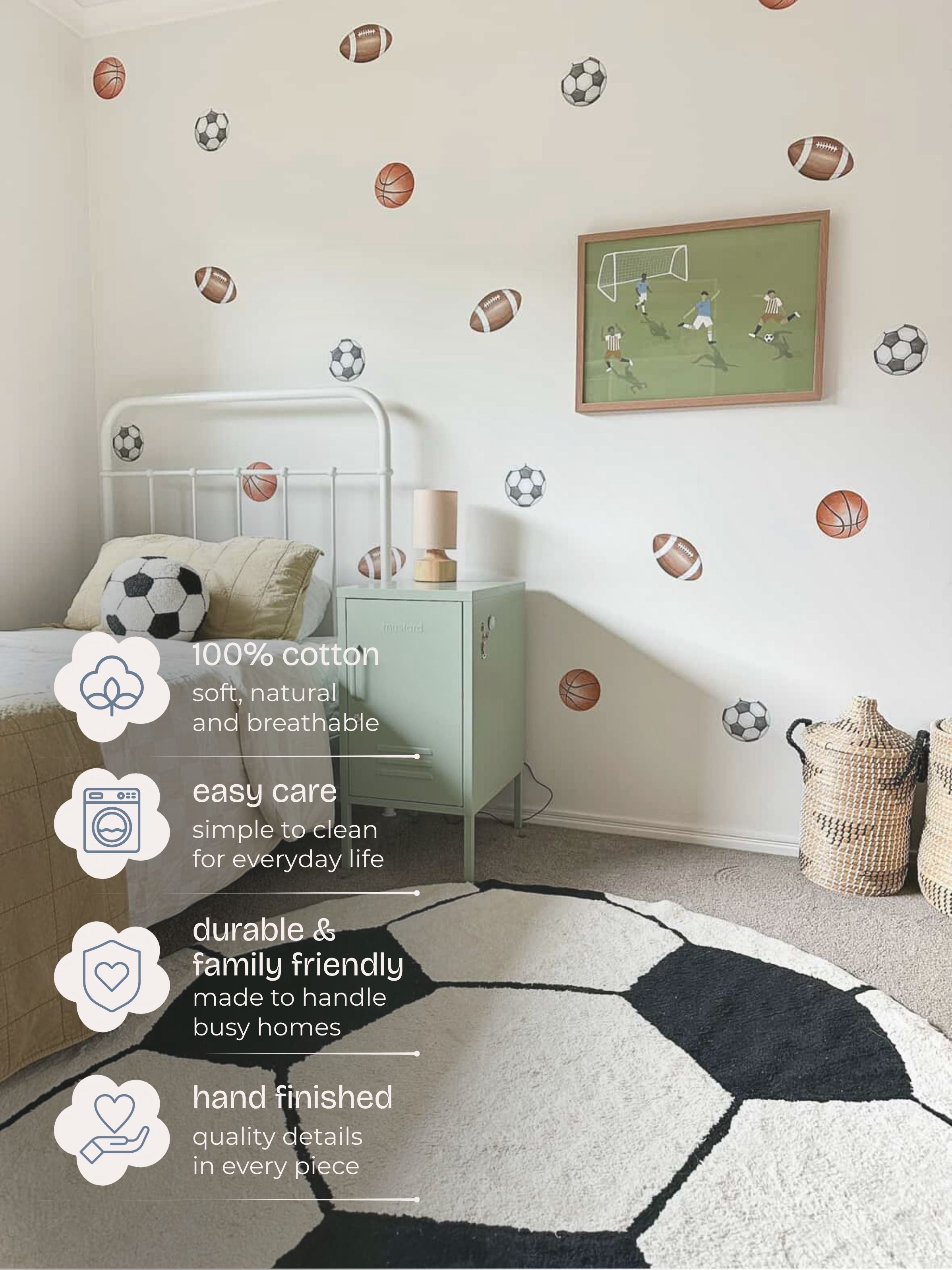 Children's bedroom with sports-themed decor, including footballs on the wall.